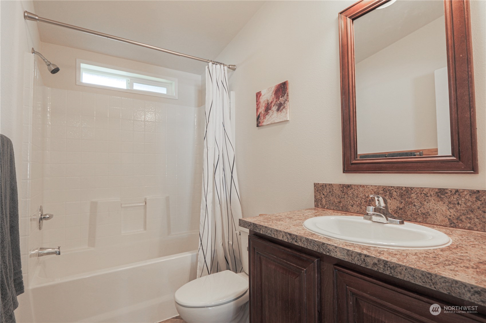 20426 32nd Drive Southeast Bothell, WA 98012 - Photo 10 of 23 a bathroom with a granite countertop sink toilet and shower