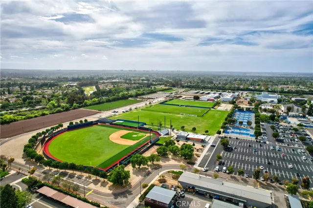 an aerial view of a pool patio patio and outdoor seating