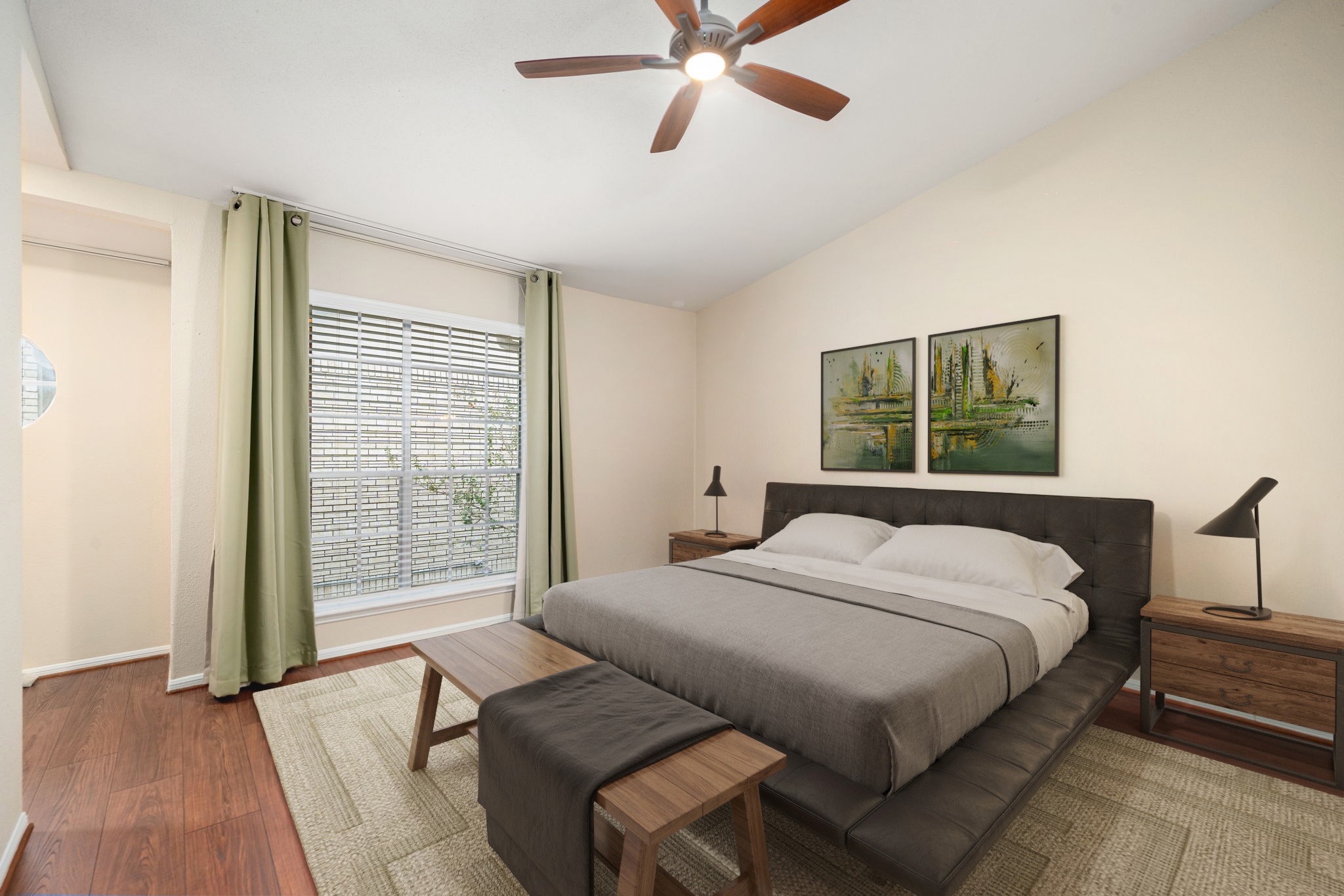 7575 Cambridge Street, Unit 1604 Houston, TX 77054 - Photo 12 of 26 a bed sitting in a bedroom next to a window