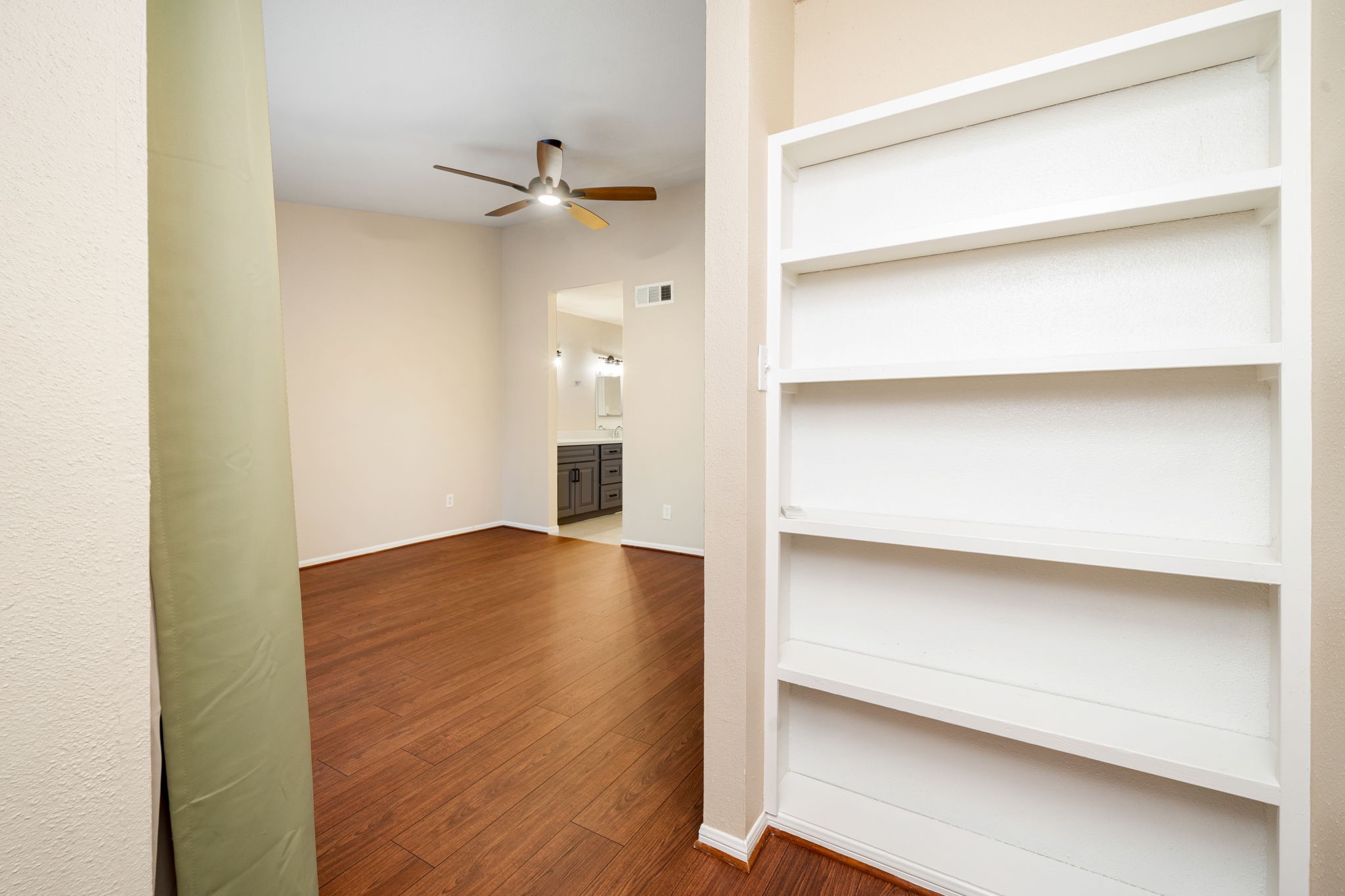 7575 Cambridge Street, Unit 1604 Houston, TX 77054 - Photo 14 of 26 a view of walk in closet with empty racks
