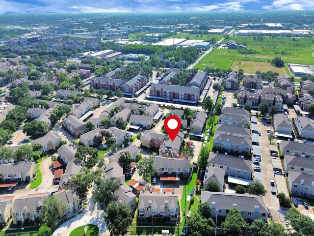 an aerial view of multiple house