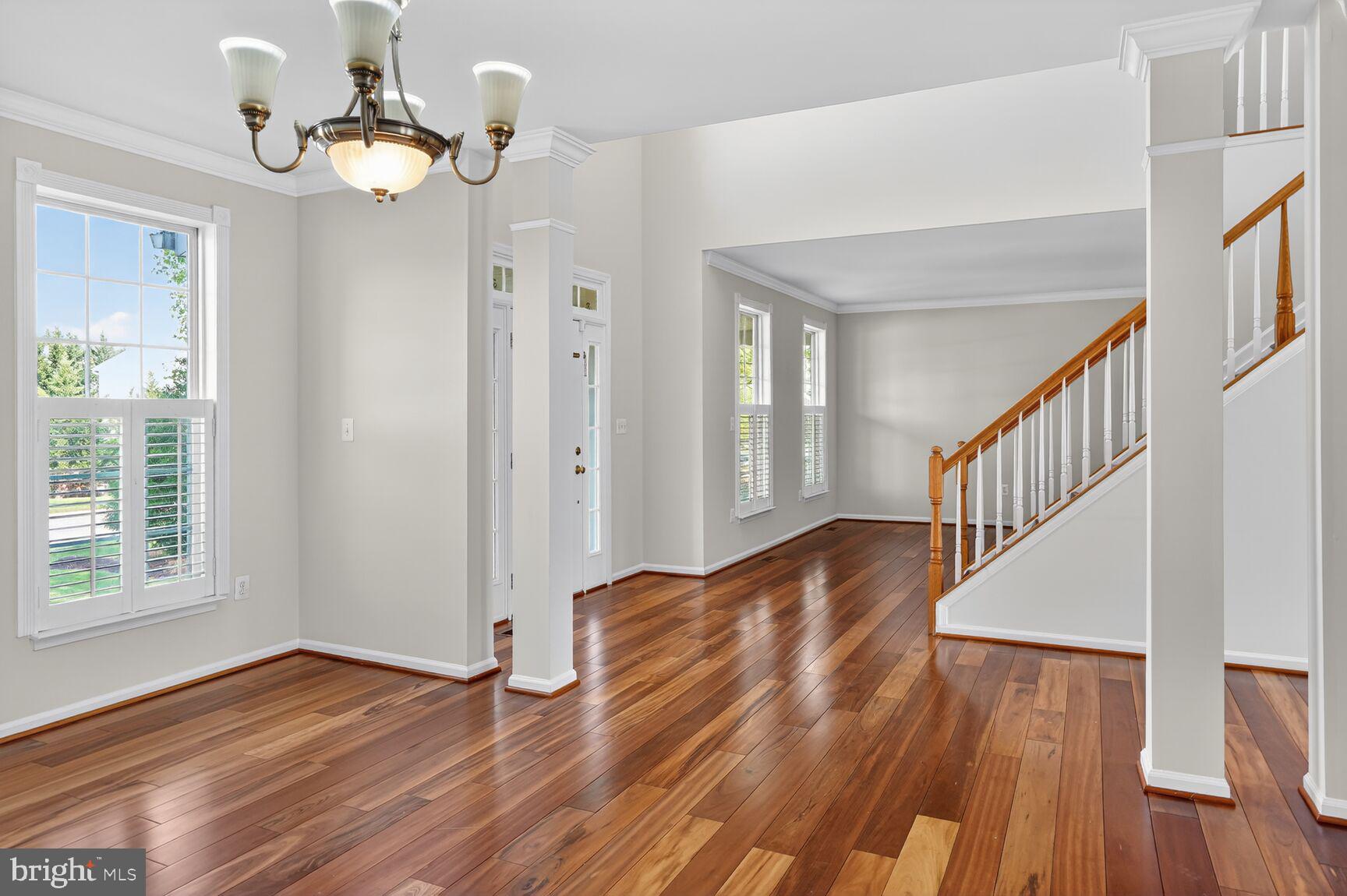 Spacious entry with elegant charm.