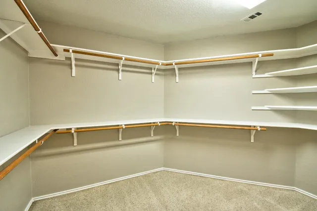a view of a room with racks on the wall