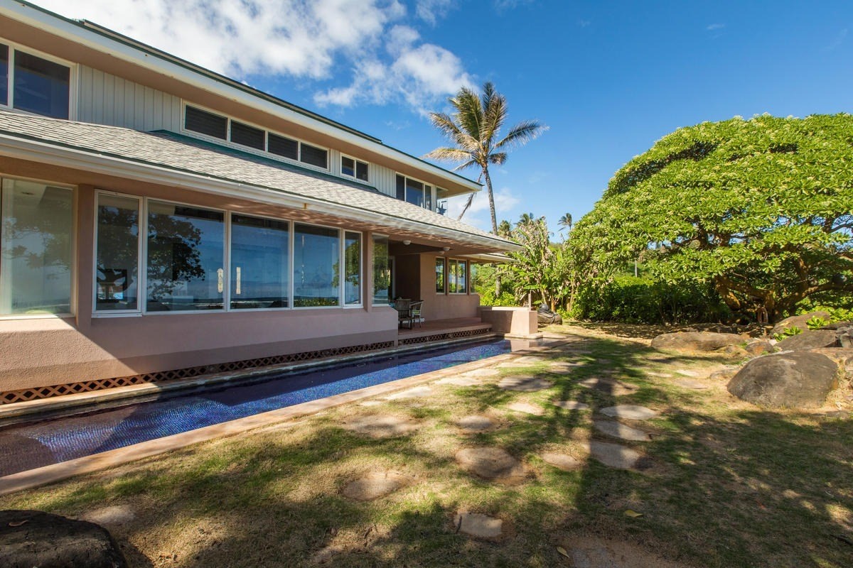 5040 Aliomanu Road Kilauea, HI 96754 - Photo 7 of 23 a view of a house with pool and sitting area