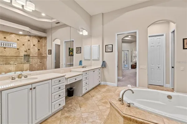 a kitchen with a window a sink and a counter