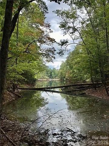 1388 Old Dry Creek Road Morganton, NC 28655 - Photo 14 of 39 a view of lake with green space
