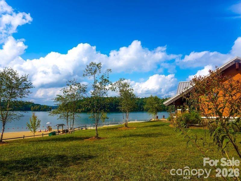 1388 Old Dry Creek Road Morganton, NC 28655 - Photo 21 of 39 a view of a fountain in front of a house