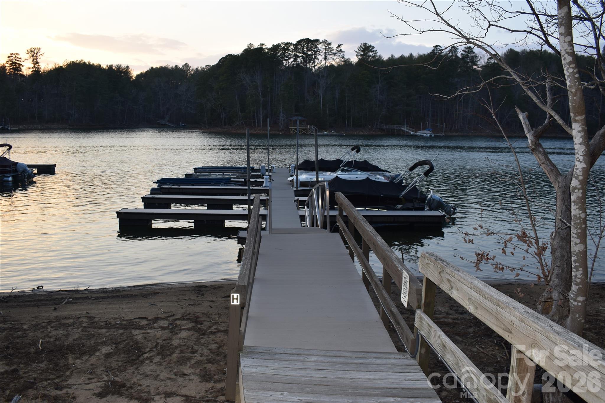 1388 Old Dry Creek Road Morganton, NC 28655 - Photo 38 of 39 a view of a terrace with a bench