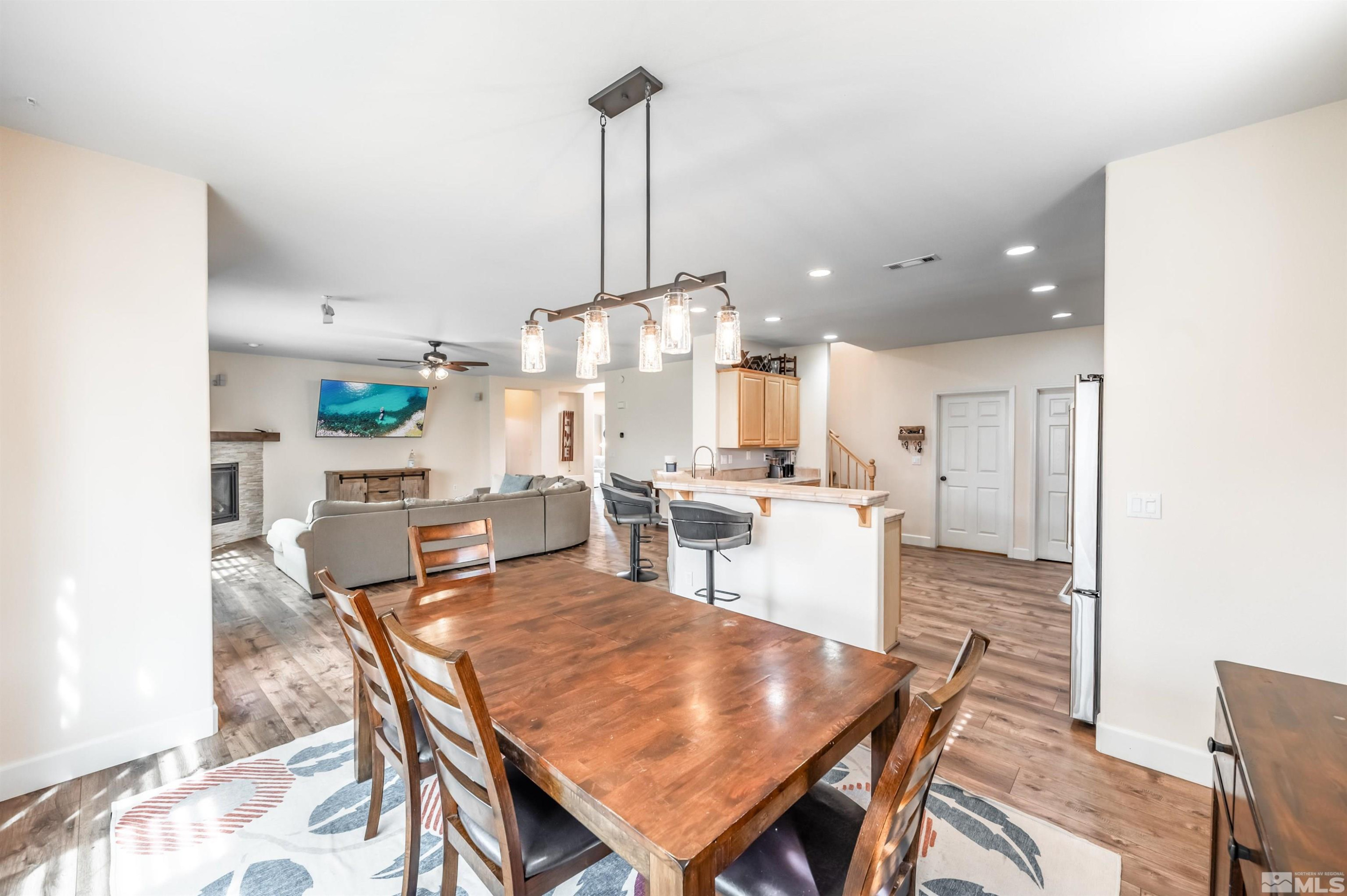 9915 Bandana Way Reno, NV 89521 - Photo 15 of 40 a view of a dining room with furniture
