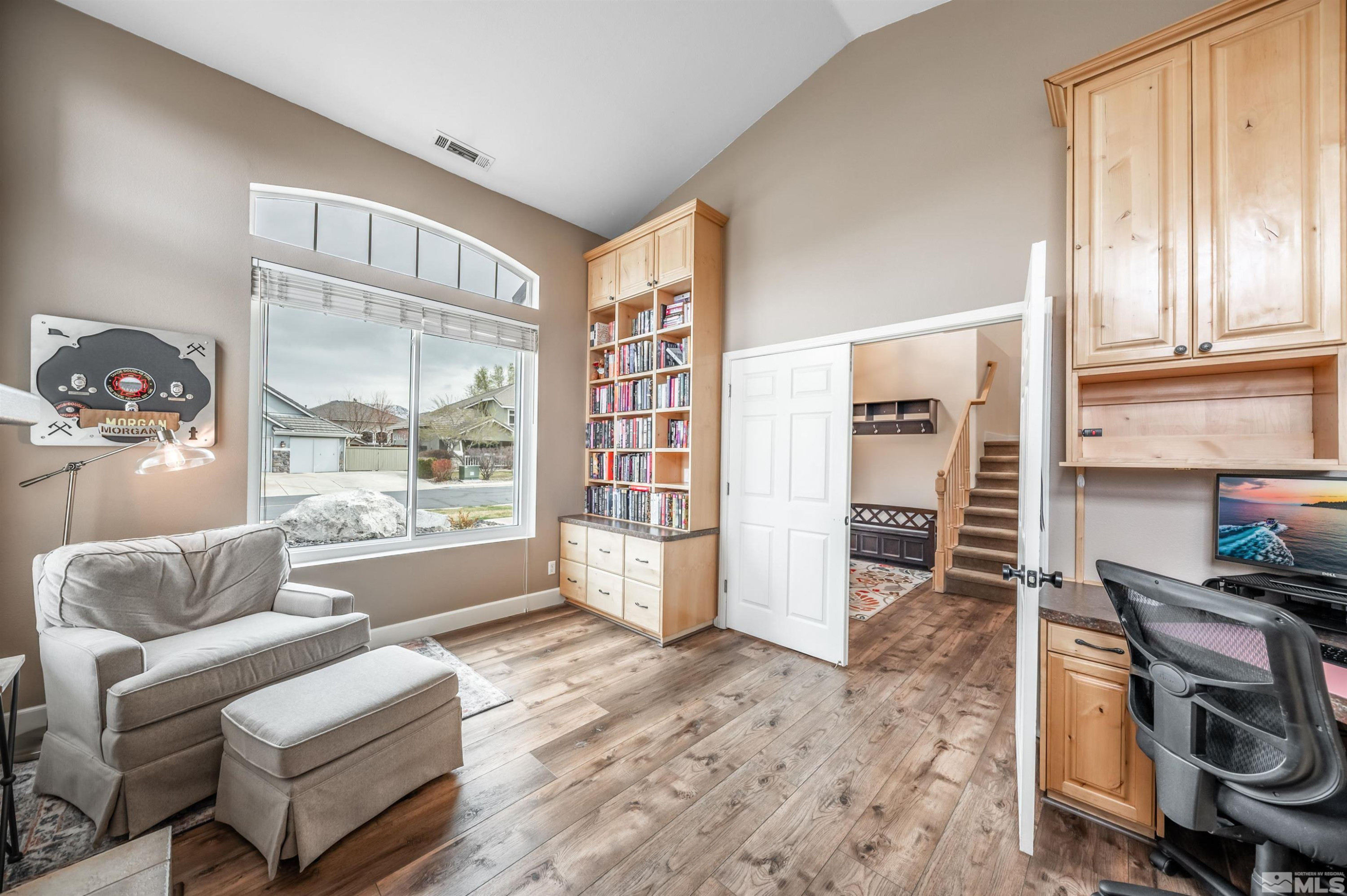 9915 Bandana Way Reno, NV 89521 - Photo 20 of 40 a living room with furniture and a window