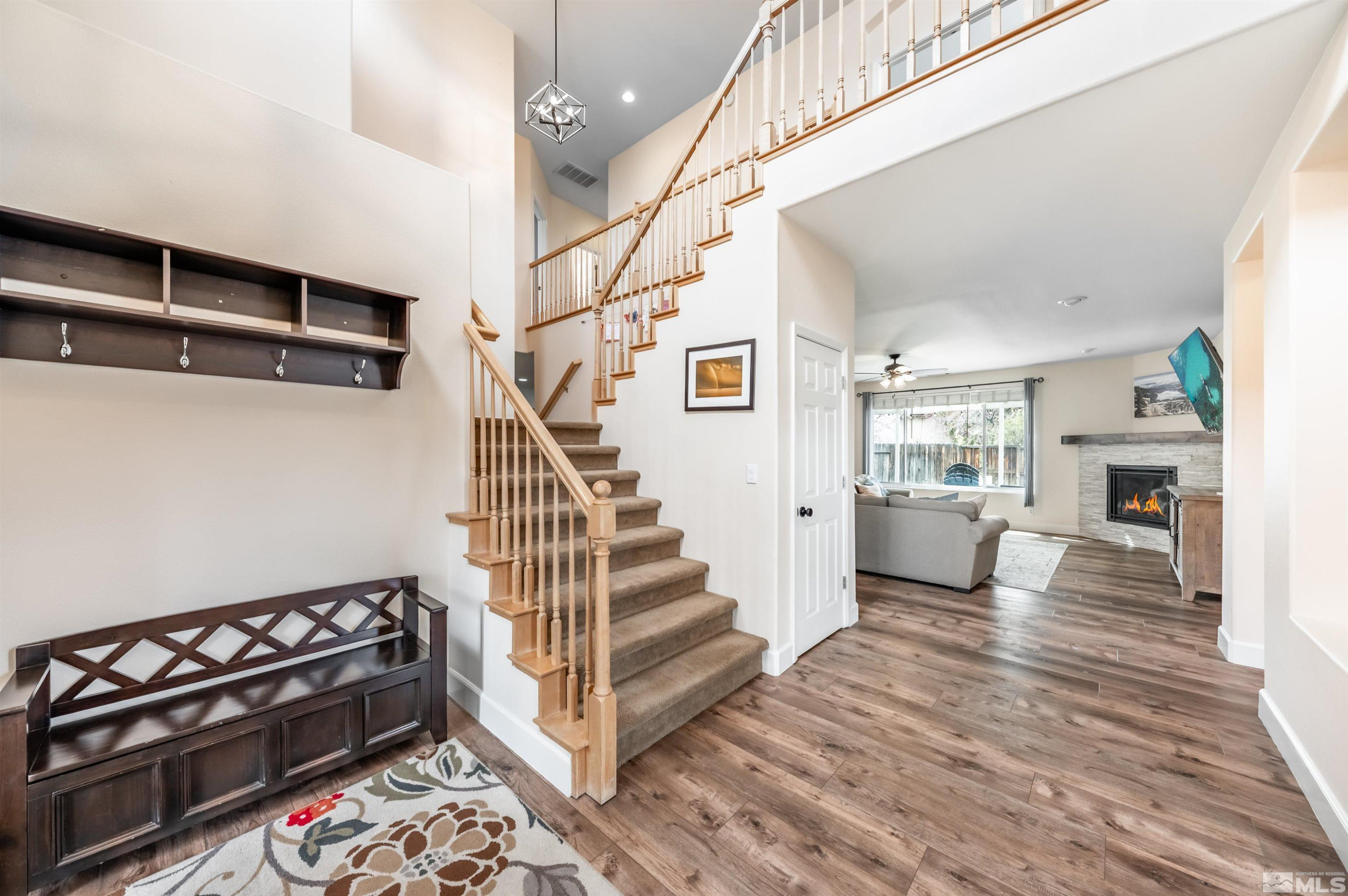 9915 Bandana Way Reno, NV 89521 - Photo 6 of 40 a view of entryway and hall with wooden floor