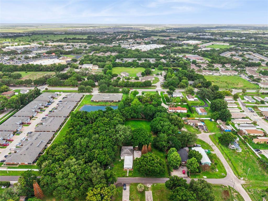 420 Jacks Memorial Road St. Cloud, FL 34769 - Photo 31 of 31 an aerial view of multiple house