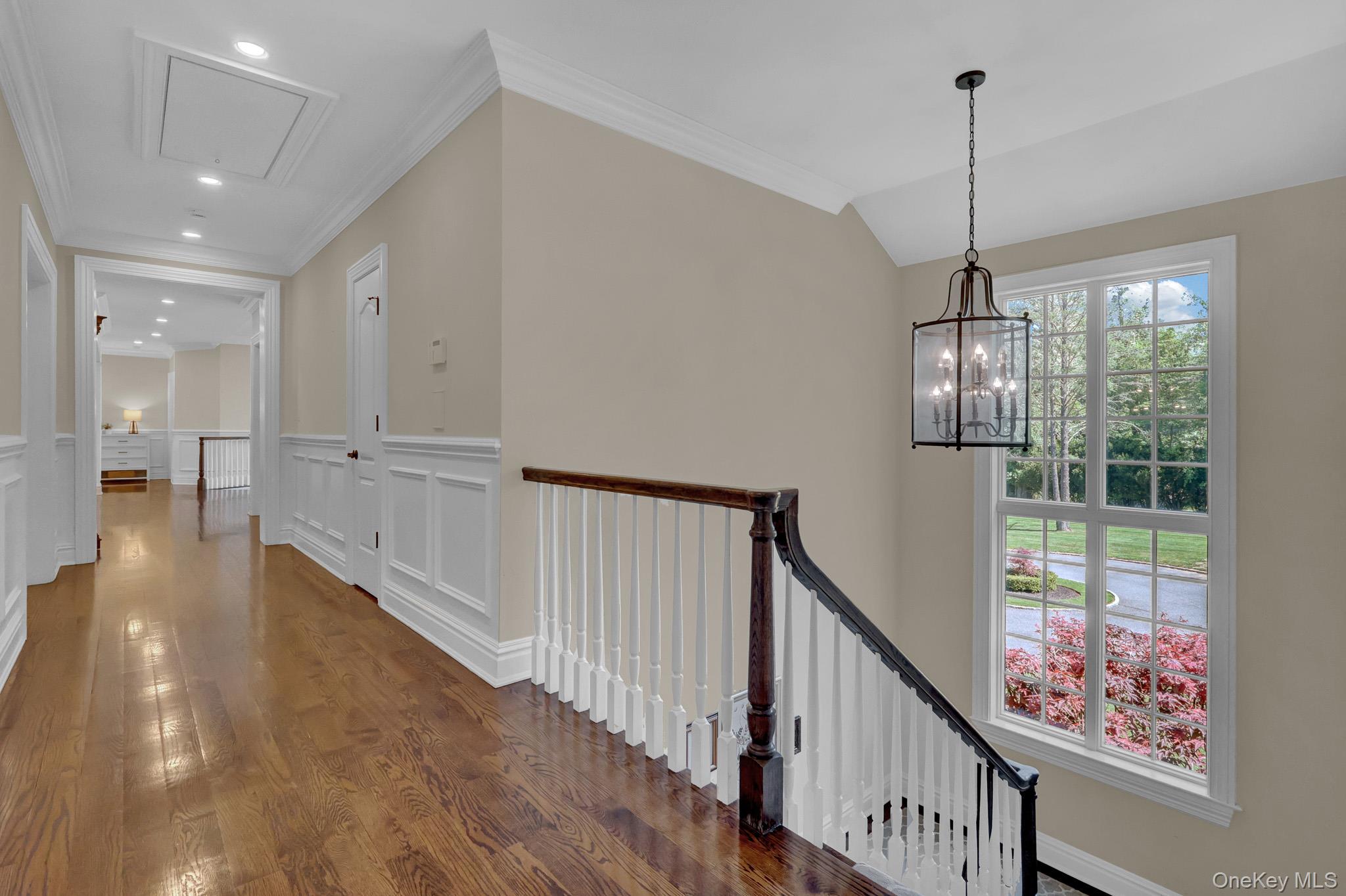 36 Old Field Road Setauket, NY 11733 - Photo 29 of 42 a view of a hallway with windows