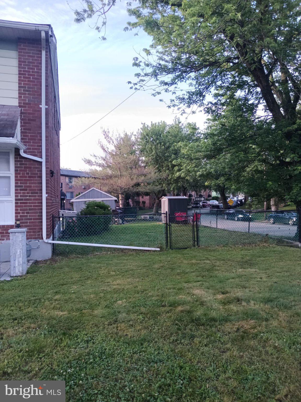 3419 Carter Lane Chester, PA 19013 - Photo 3 of 52 Spacious yard with lush greenery.