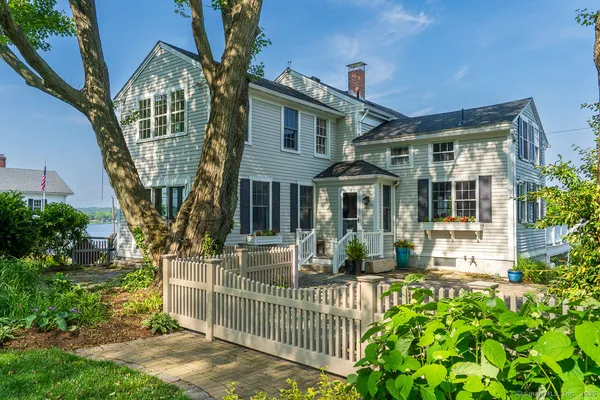 front view of a house with a small yard