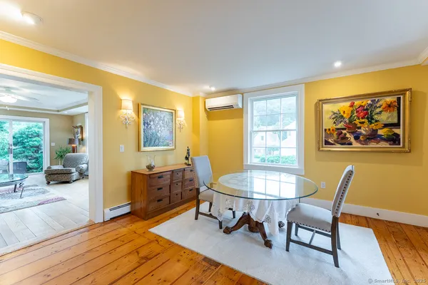 a living room with furniture and a table