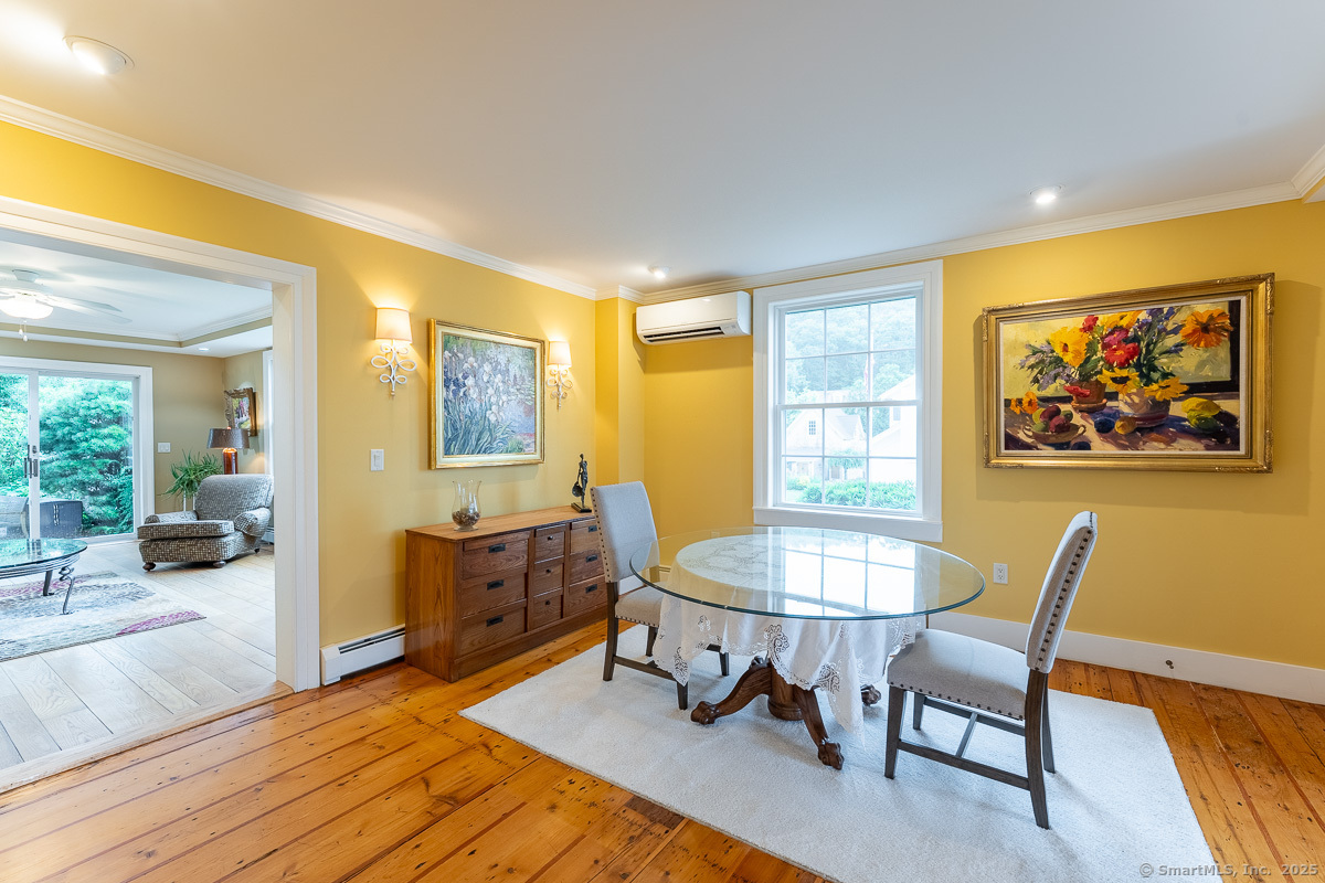 105 River Road Groton, CT 06355 - Photo 24 of 39 a living room with furniture and a table