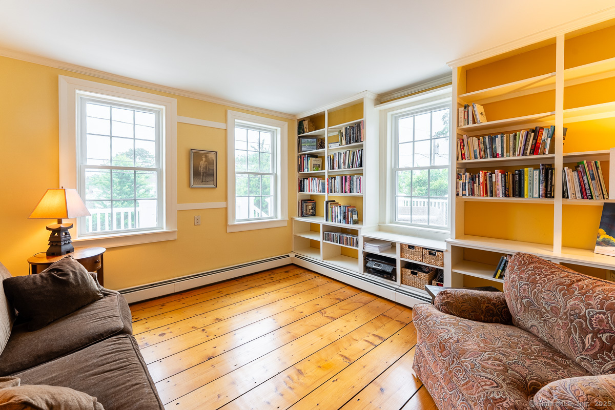 105 River Road Groton, CT 06355 - Photo 25 of 39 a living room with furniture and a window