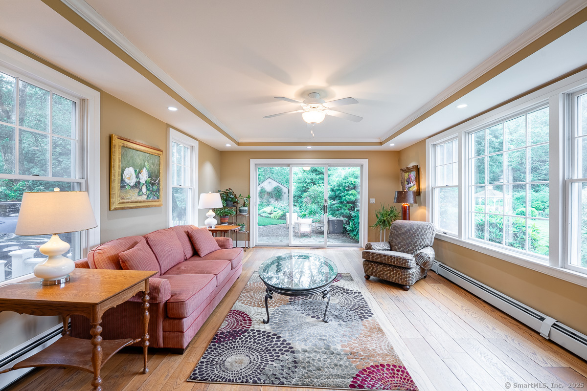 105 River Road Groton, CT 06355 - Photo 27 of 39 a living room with furniture and a large window
