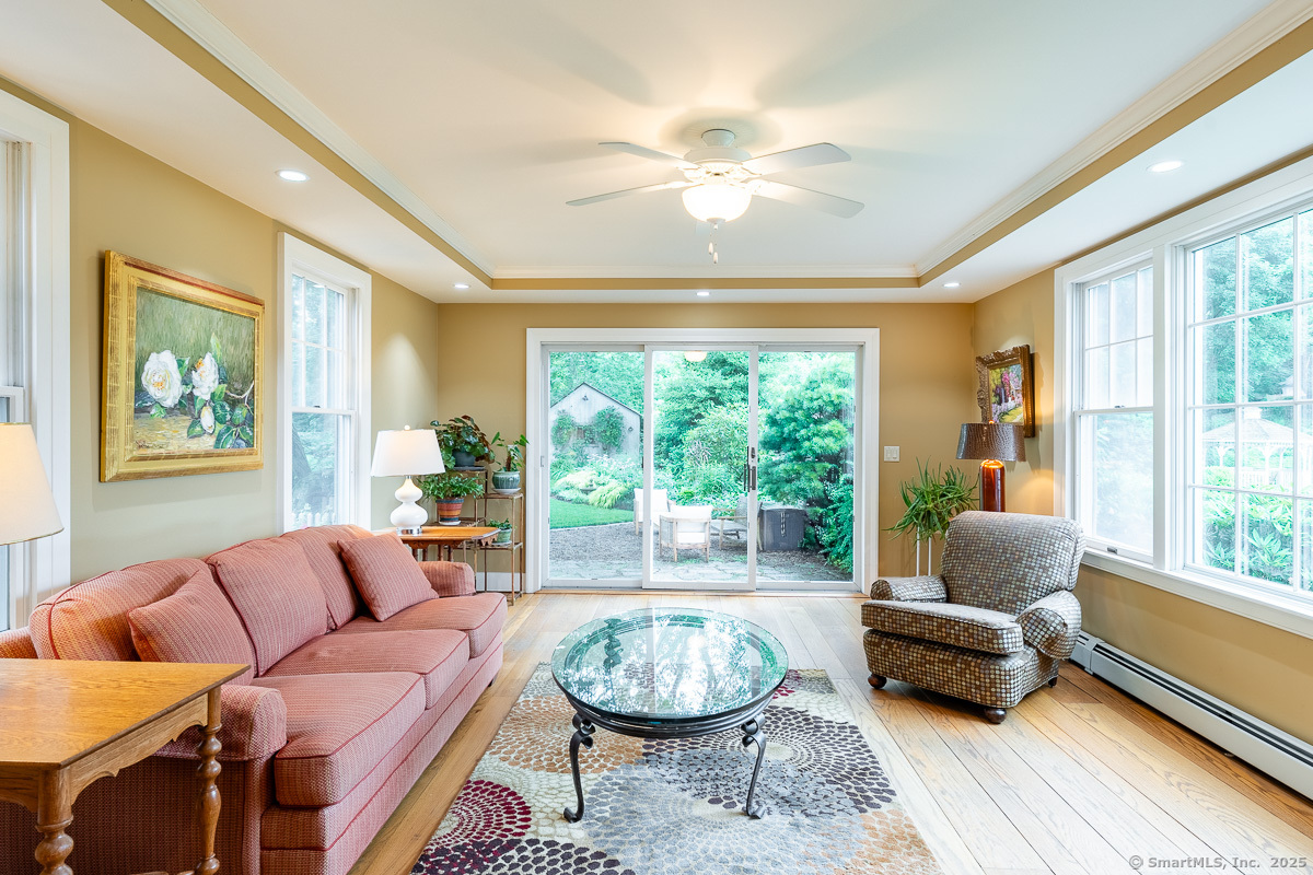 105 River Road Groton, CT 06355 - Photo 31 of 39 a living room with furniture and a large window