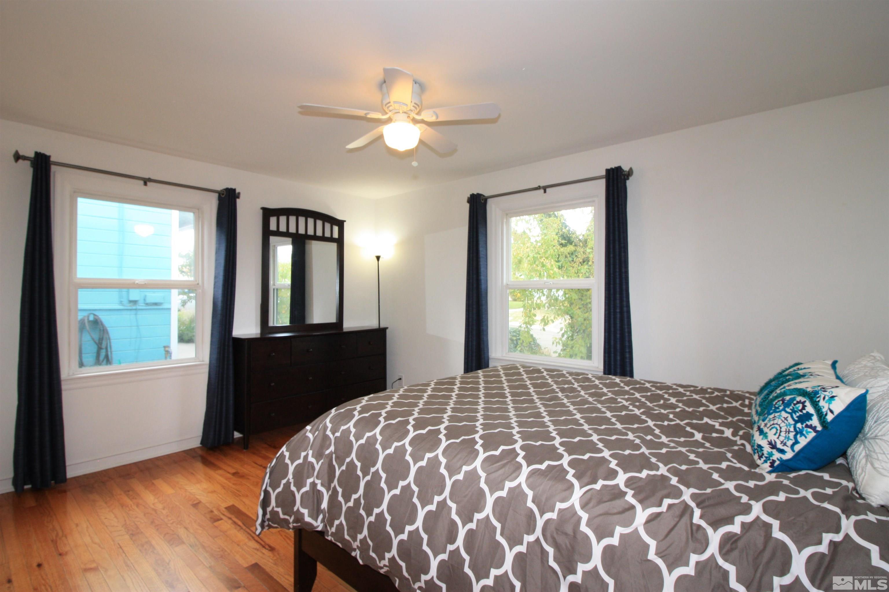 540 Toiyabe Street Reno, NV 89509 - Photo 15 of 29 a bedroom with a bed and a window