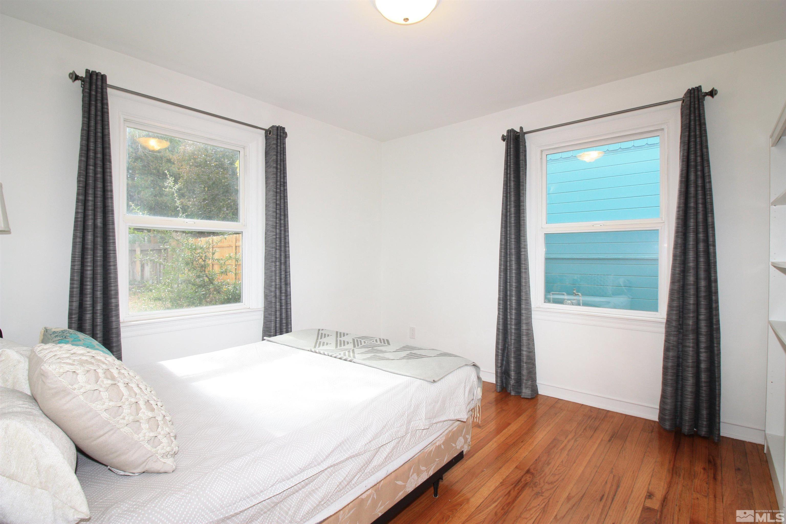 540 Toiyabe Street Reno, NV 89509 - Photo 17 of 29 a bedroom with a bed and a window