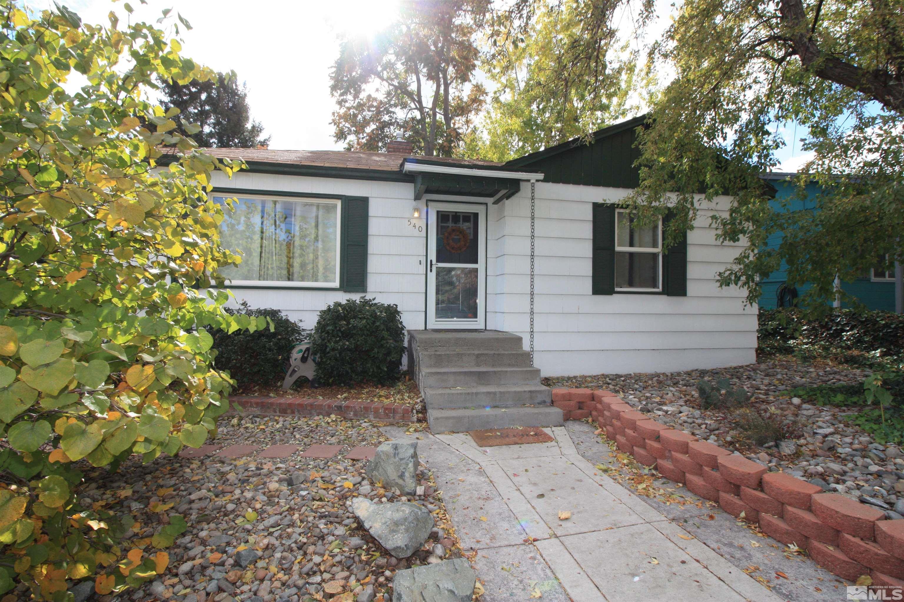 540 Toiyabe Street Reno, NV 89509 - Photo 26 of 29 a view of a house with a yard
