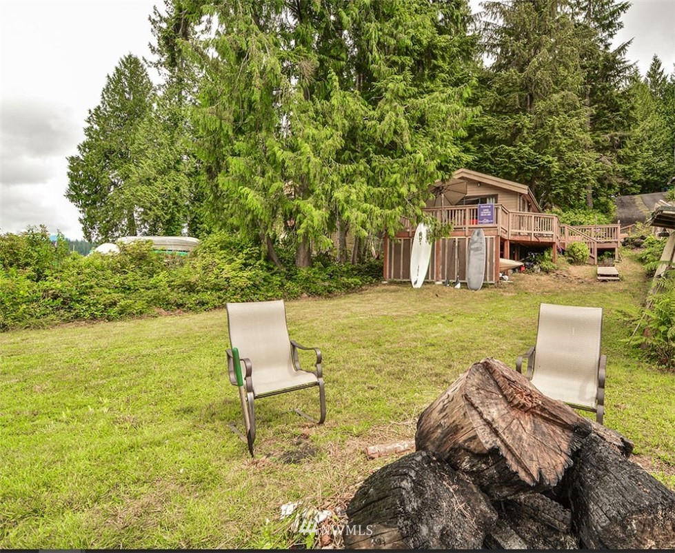 1018 South Lake Roesiger Road Snohomish, WA 98290 - Photo 22 of 25 a view of a patio with chairs and a table with chairs