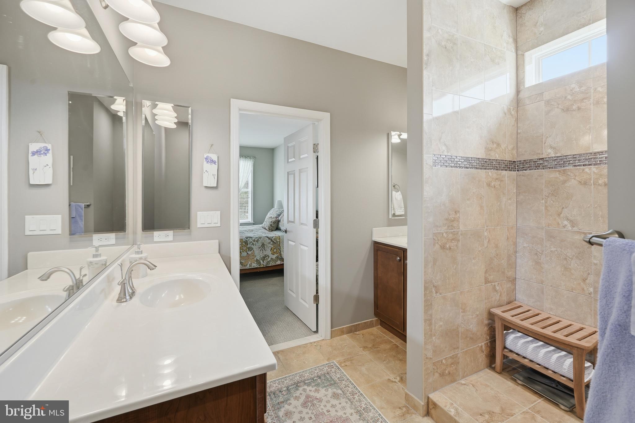 31880 Two Ponds Road Selbyville, DE 19975 - Photo 21 of 35 Primary Ensuite Bath with Custom Tile Shower.