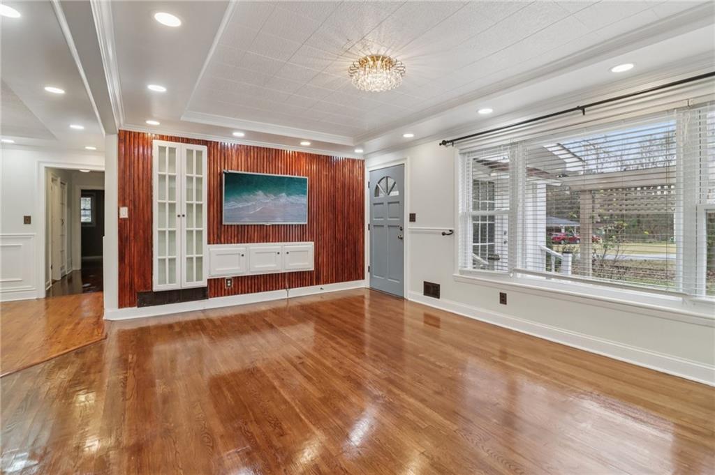 716 Carolina Road Marietta, GA 30008 - Photo 12 of 71 a view of an empty room with a window and kitchen view