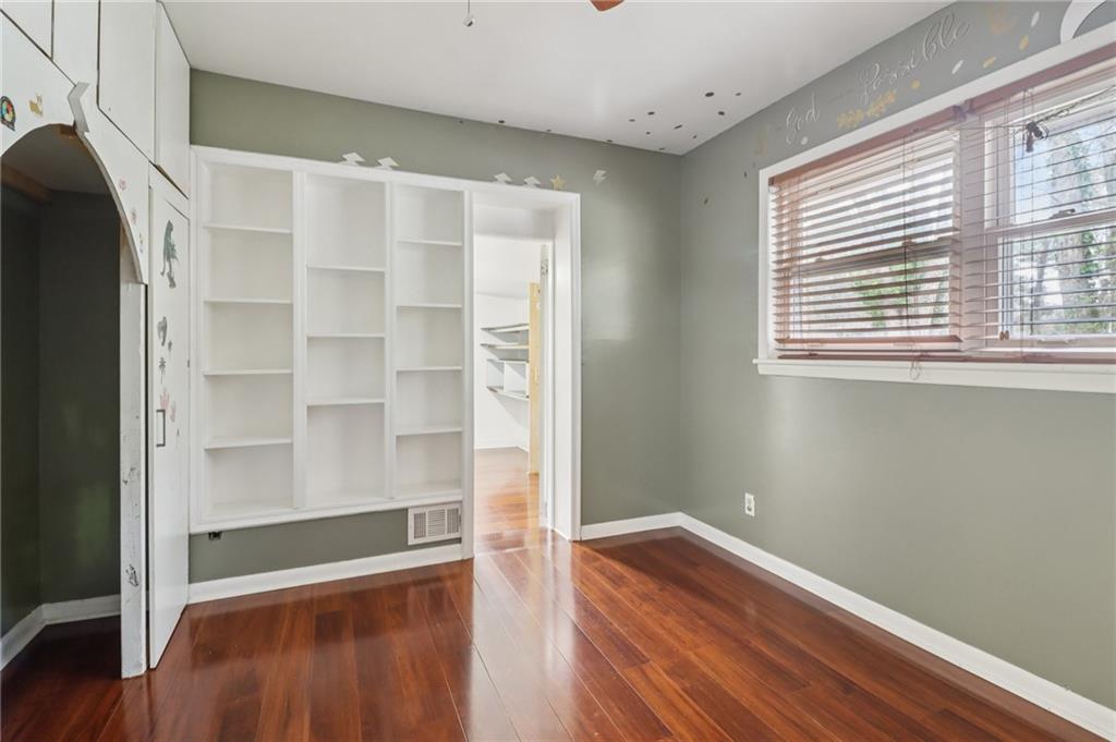 716 Carolina Road Marietta, GA 30008 - Photo 31 of 71 a view of walk in closet with empty racks