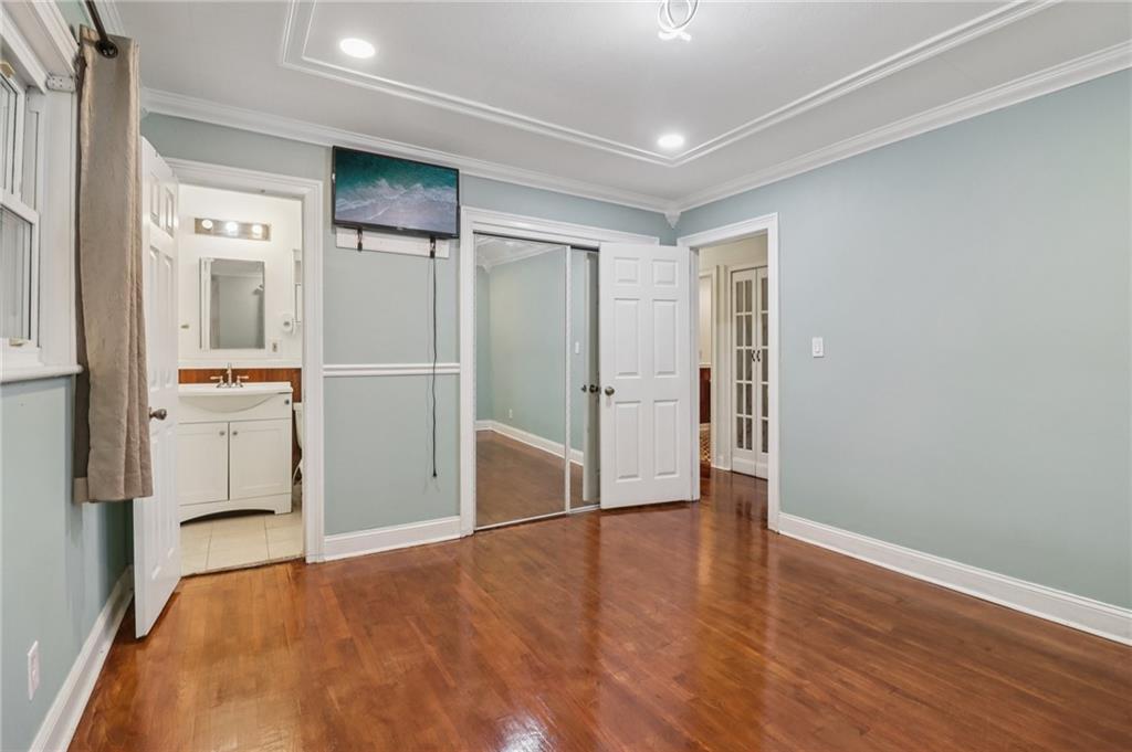 716 Carolina Road Marietta, GA 30008 - Photo 40 of 71 a view of empty room with wooden floor and cabinets