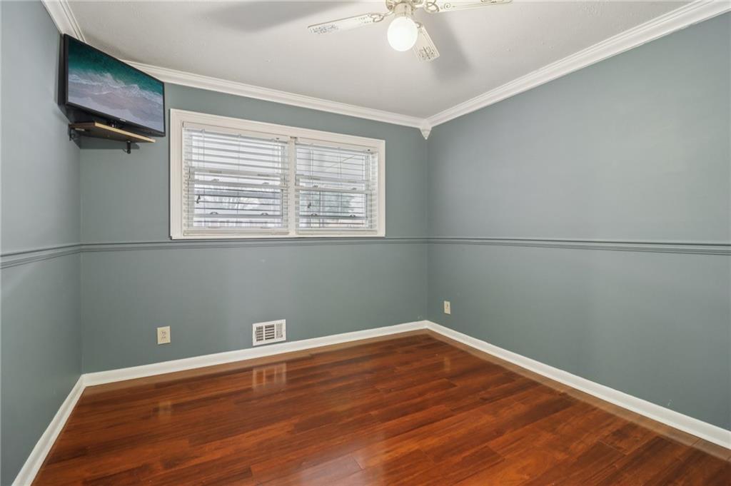716 Carolina Road Marietta, GA 30008 - Photo 43 of 71 a view of a room with wooden floor and windows