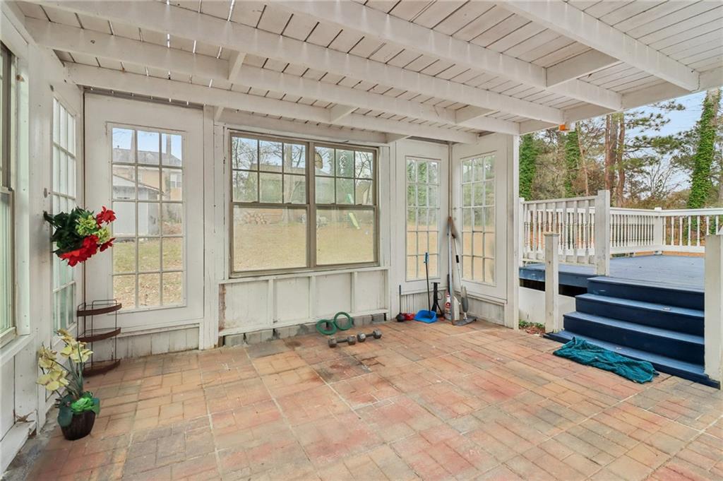 716 Carolina Road Marietta, GA 30008 - Photo 52 of 71 a view of a porch with a bench