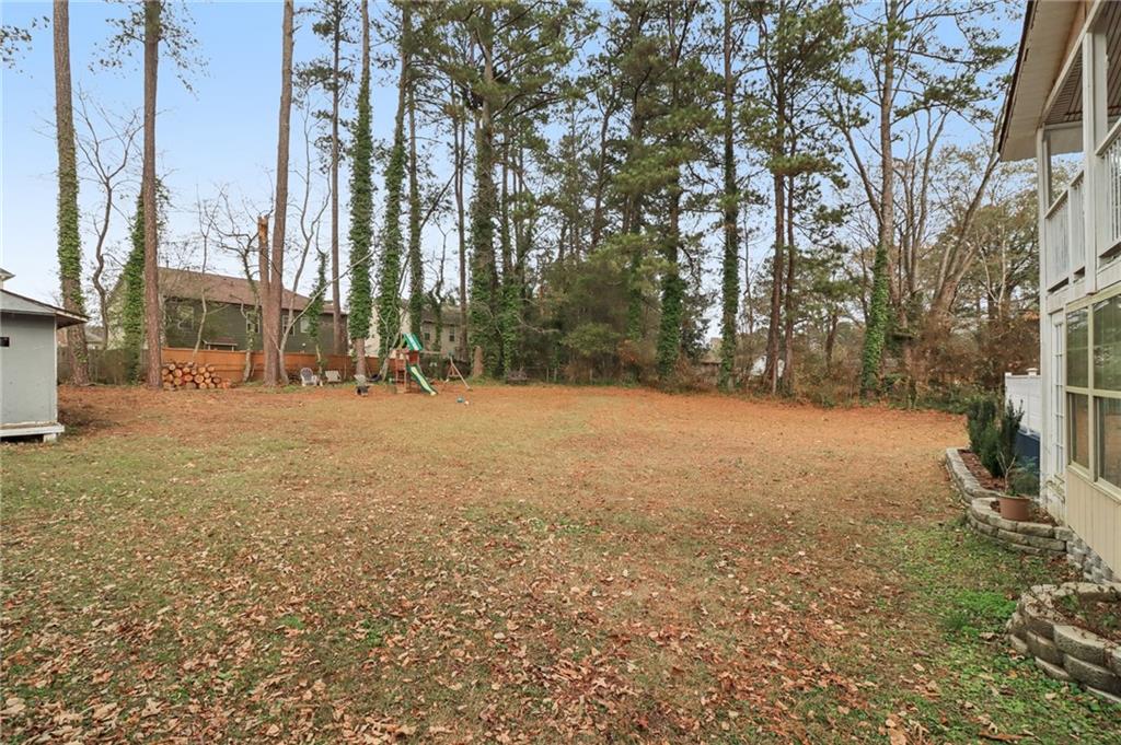 716 Carolina Road Marietta, GA 30008 - Photo 59 of 71 a view of a yard with a house