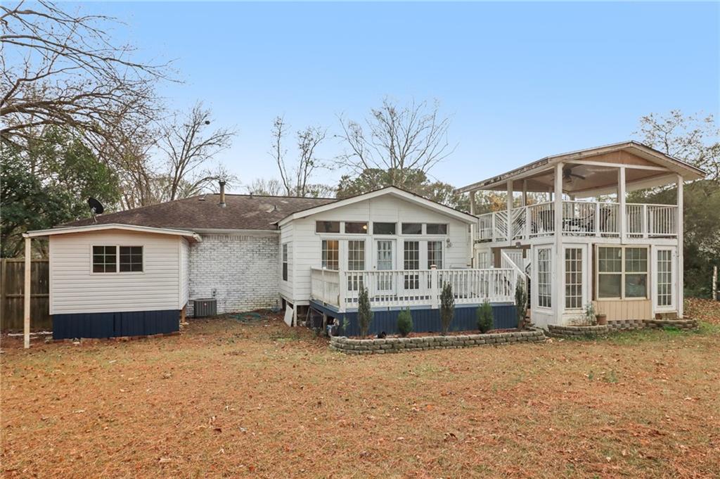 716 Carolina Road Marietta, GA 30008 - Photo 62 of 71 a front view of a house with a yard
