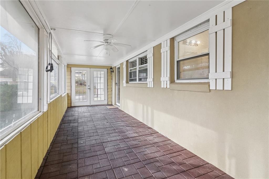 716 Carolina Road Marietta, GA 30008 - Photo 9 of 71 a view of a hallway with wooden floor and windows