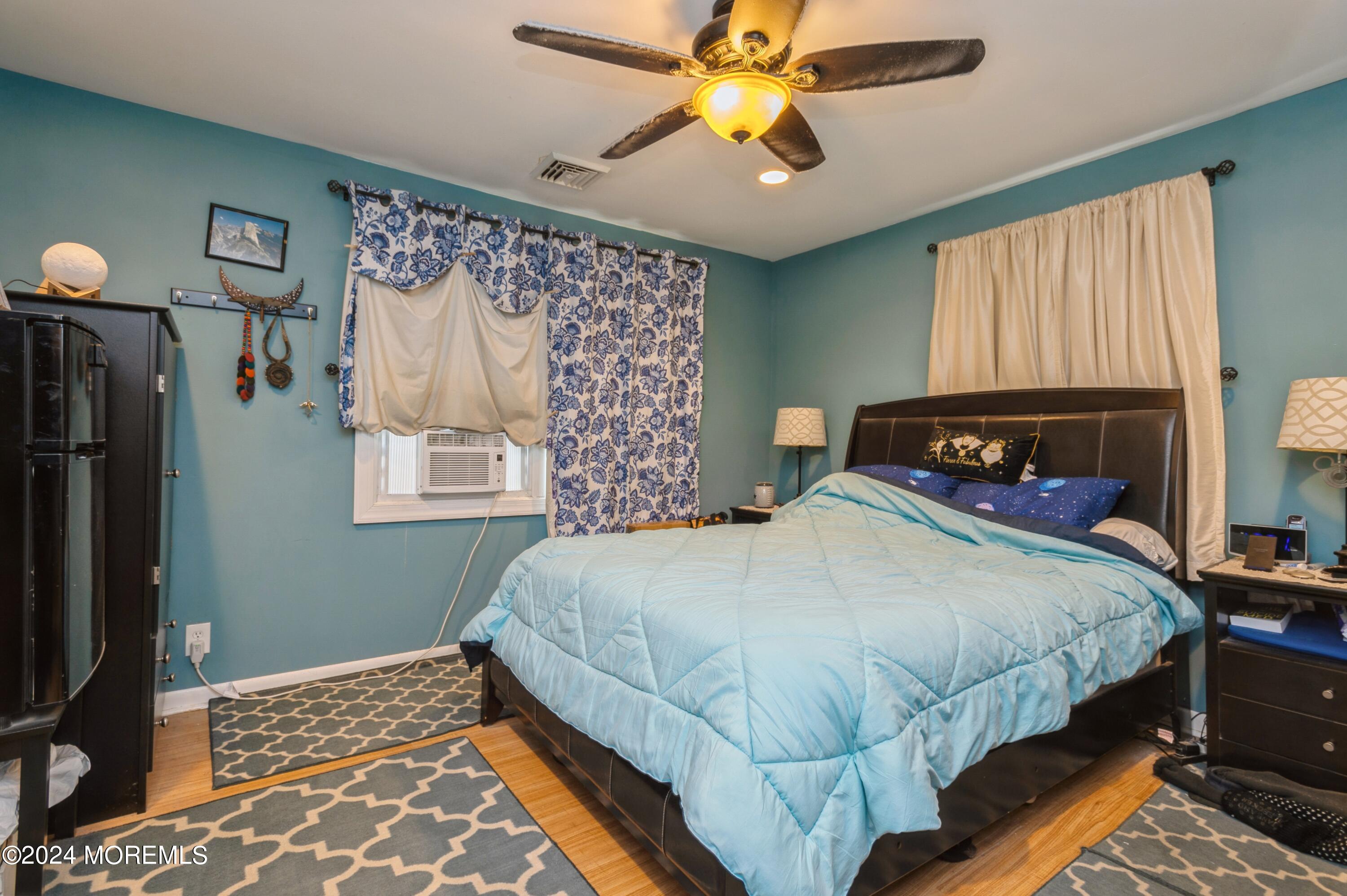 62 Capri Drive Brick, NJ 08723 - Photo 14 of 22 a bedroom with a bed and a window