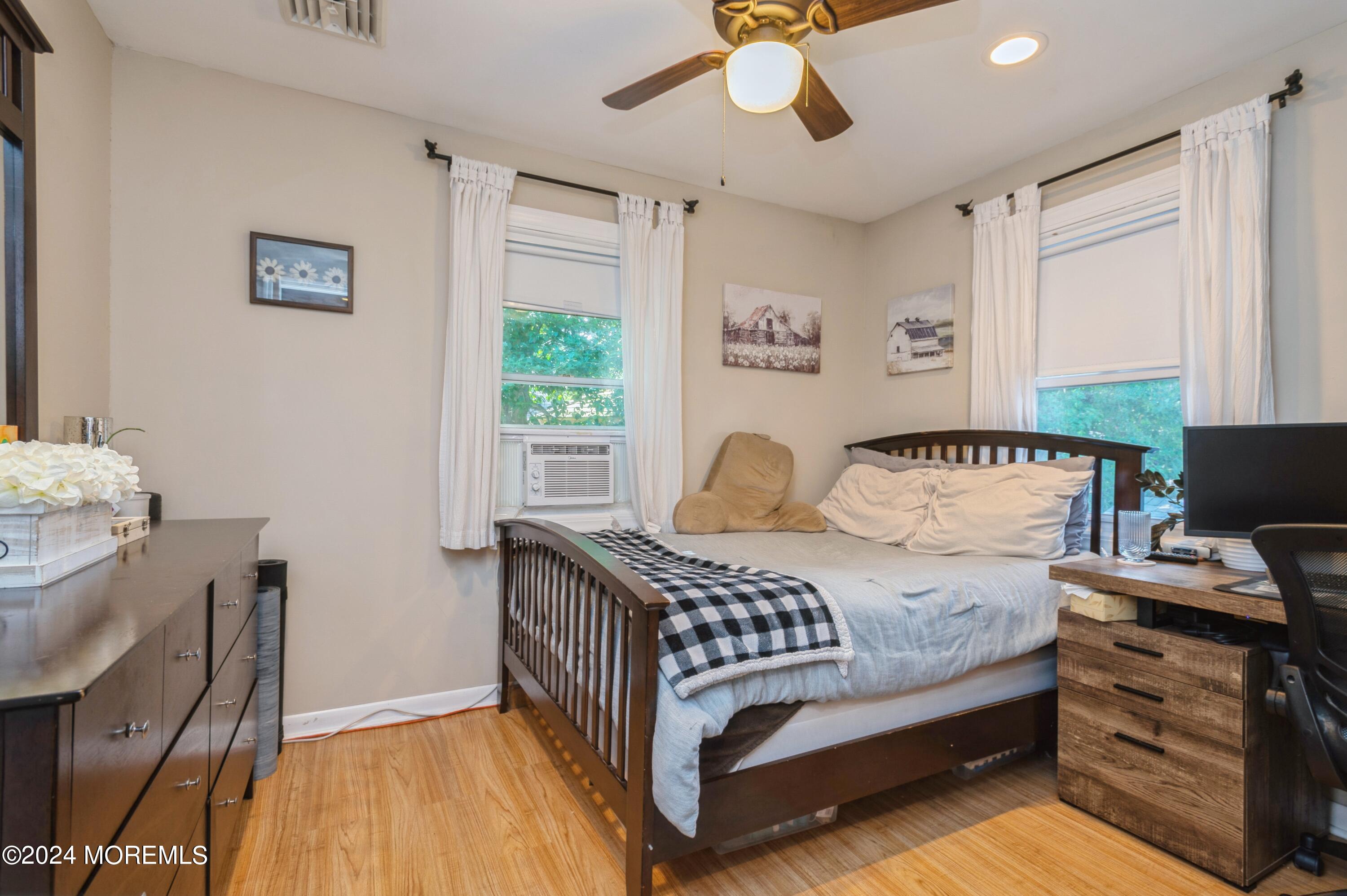 62 Capri Drive Brick, NJ 08723 - Photo 15 of 22 a bedroom with a bed and a window