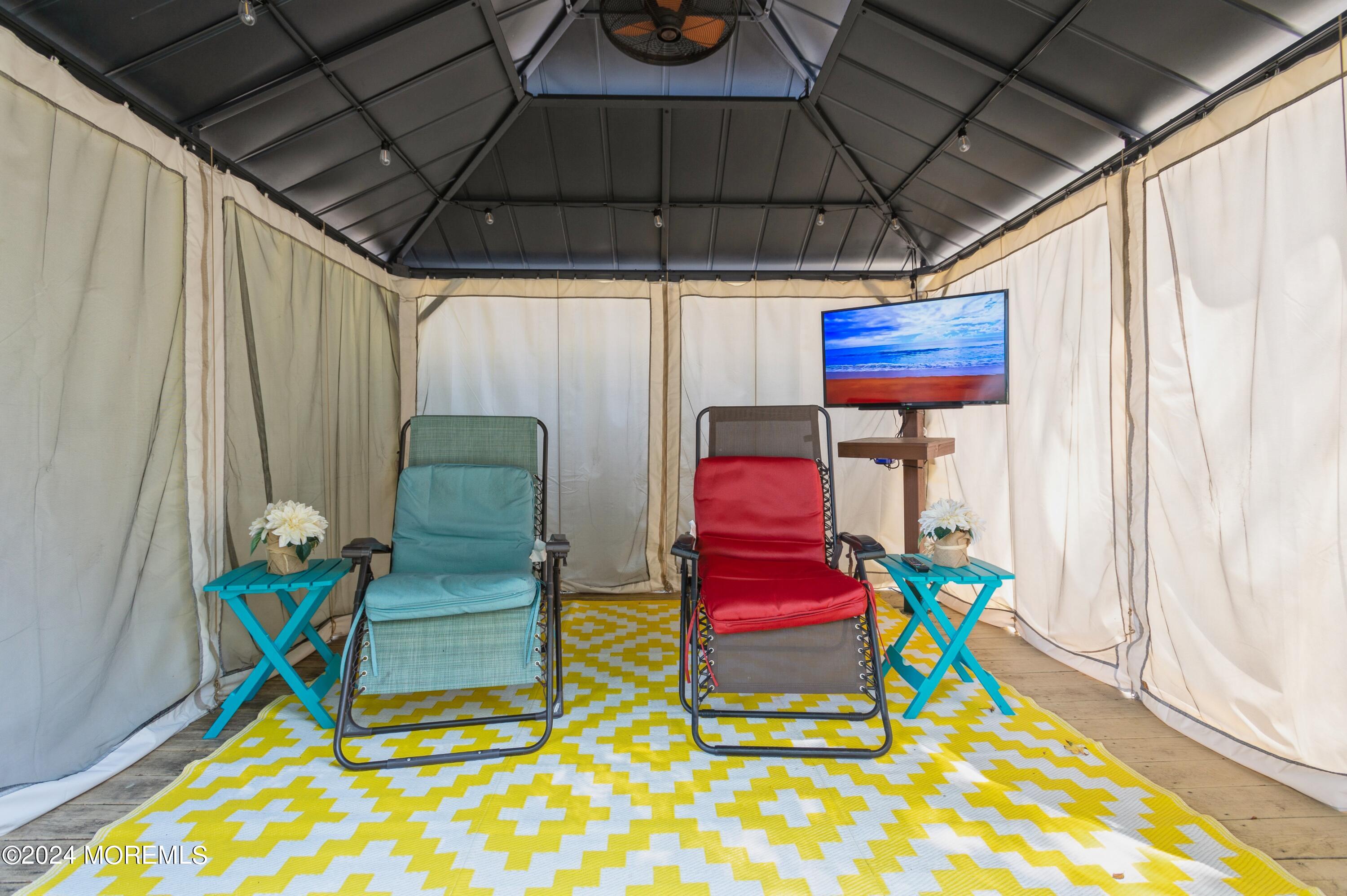 62 Capri Drive Brick, NJ 08723 - Photo 21 of 22 a view of a chairs and table in patio