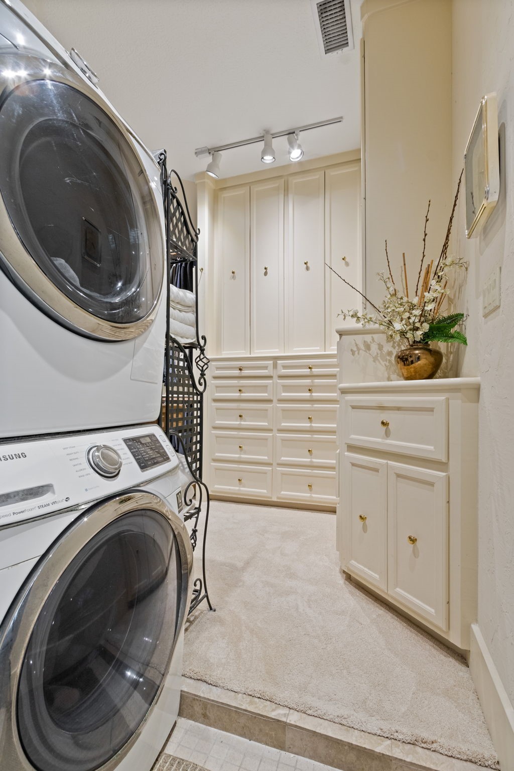 17511 Seidel Road Tomball, TX 77377 - Photo 31 of 49 This convenient utility area, located just off the walk-in shower, is ready for your washer and dryer. It leads to a spacious dressing area, offering everything you need in one place.