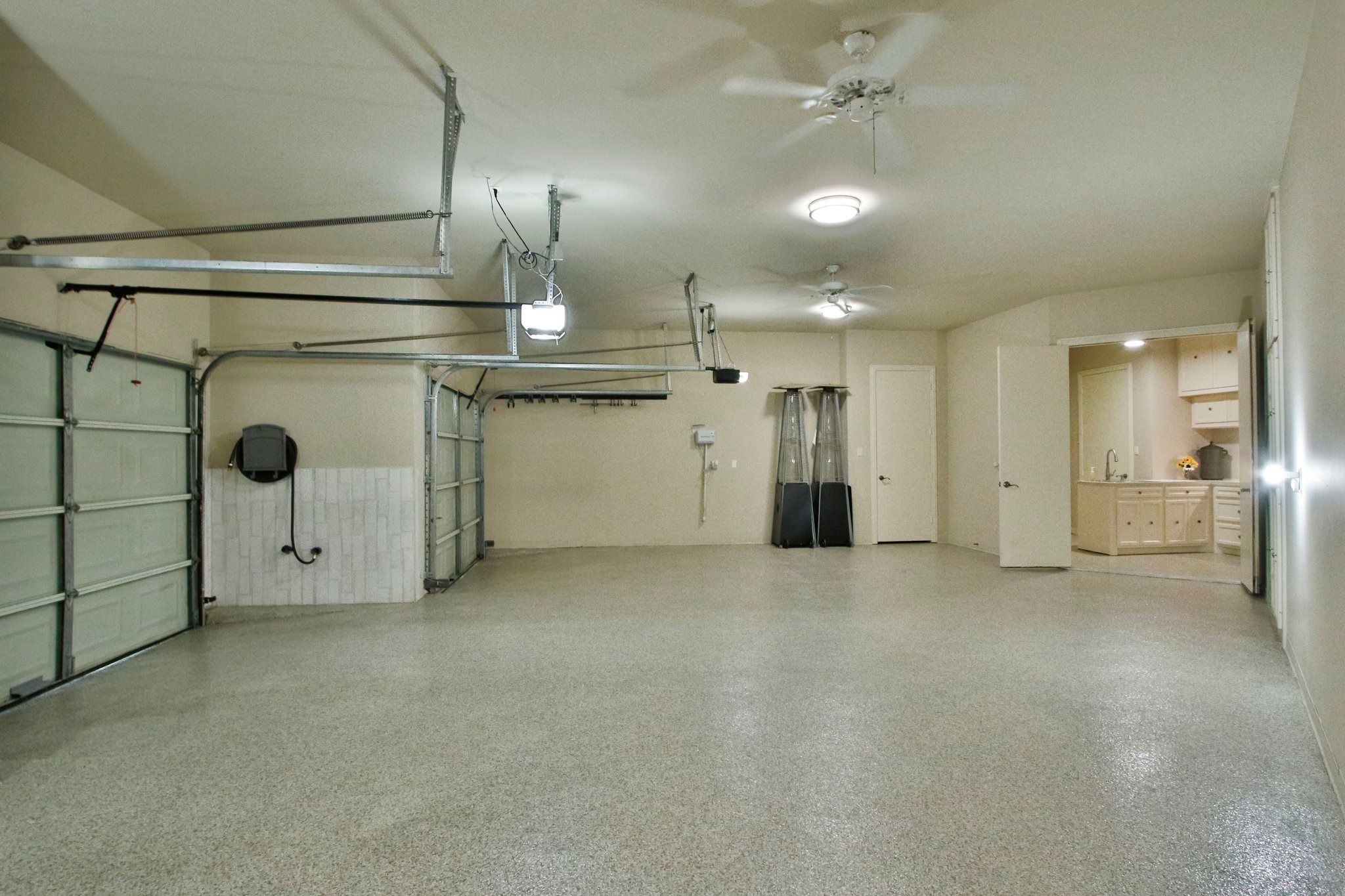 17511 Seidel Road Tomball, TX 77377 - Photo 38 of 49 This spacious, well-lit 3 car garage features ceiling fans, and epoxy for that nice and clean look.