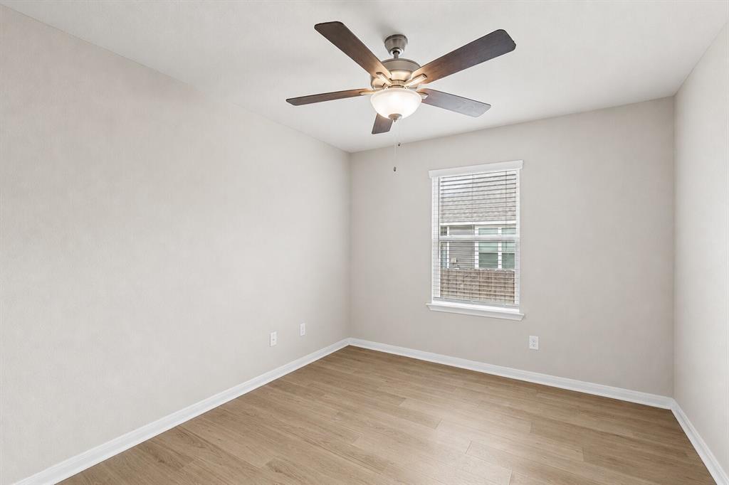 3213 Dottavio Road Lorena, TX 76655 - Photo 26 of 32 an empty room with a window and ceiling fan