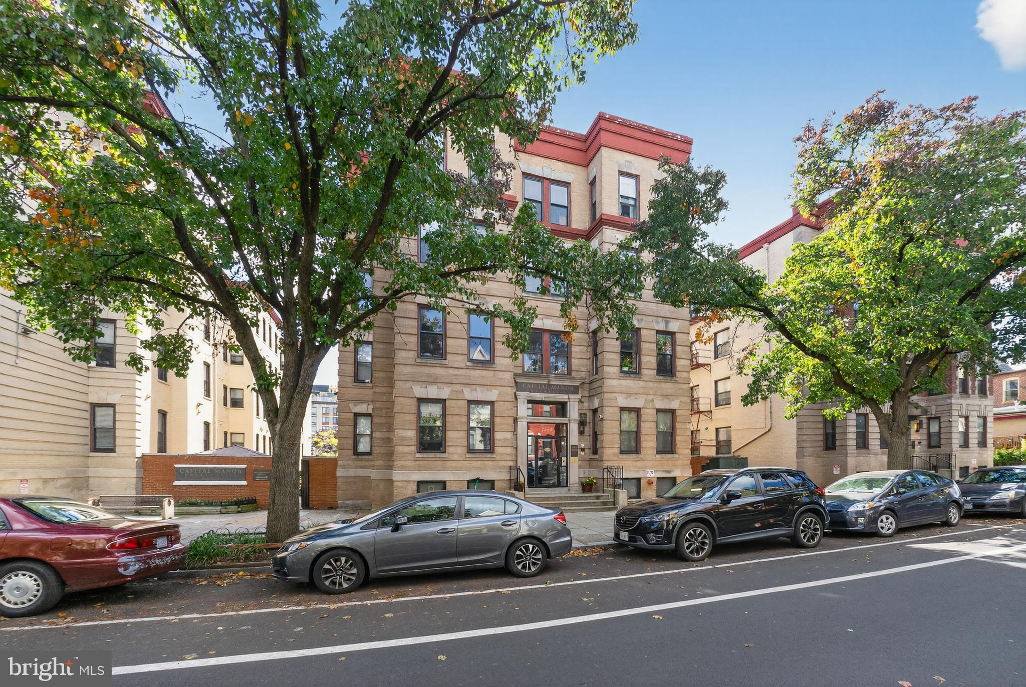 1440 W Street Northwest, Unit 304 Washington, DC 20009 - Photo 15 of 15 a view of a cars parked on the side of a street