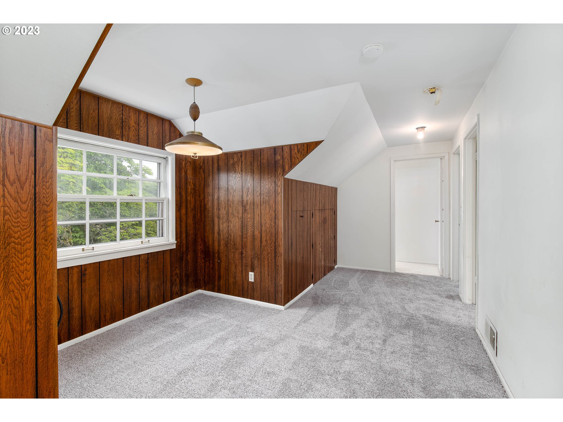 7343 North Foss Avenue Portland, OR 97203 - Photo 18 of 39 a view of an empty room with a window
