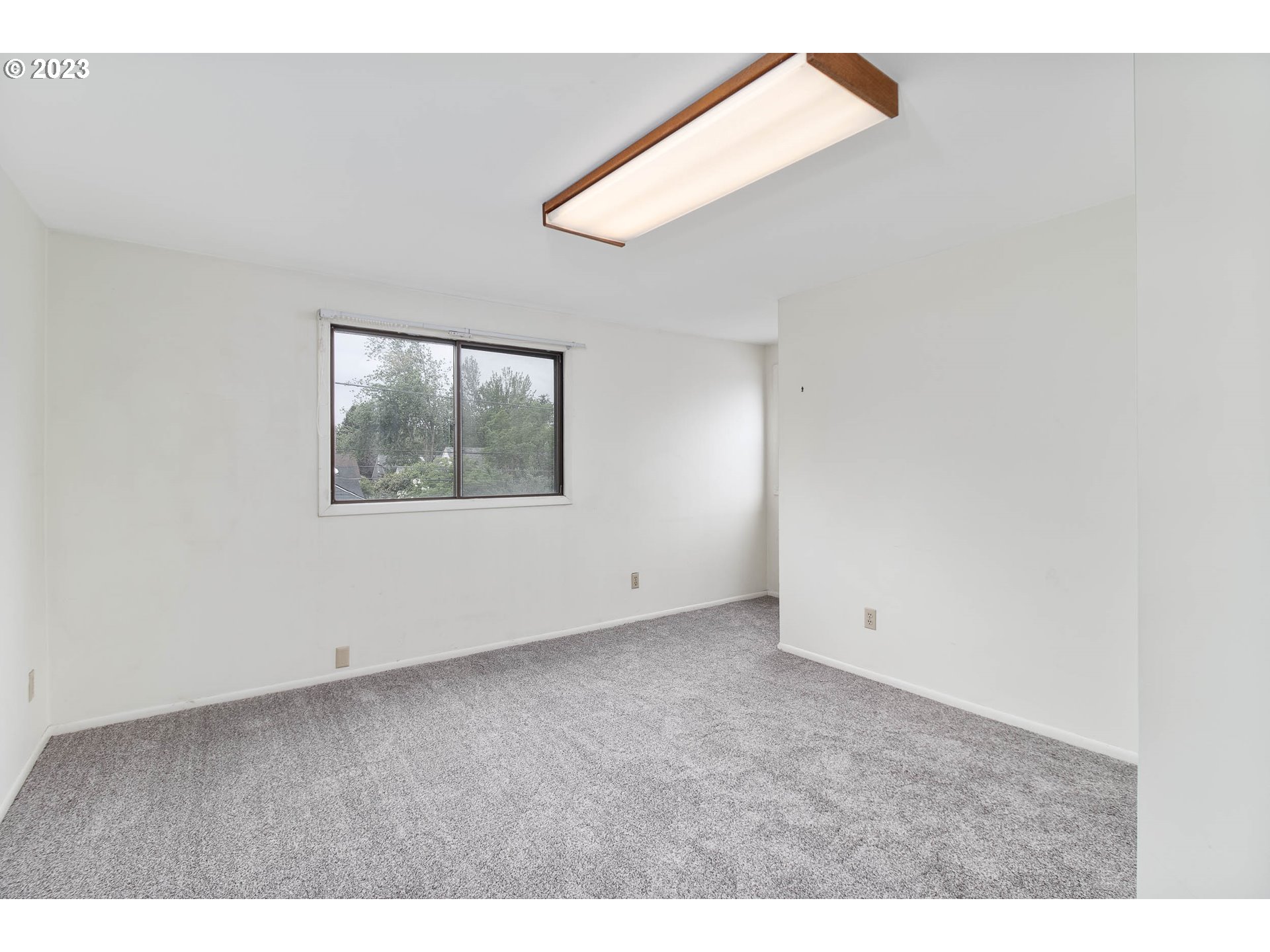 7343 North Foss Avenue Portland, OR 97203 - Photo 23 of 39 an empty room with windows