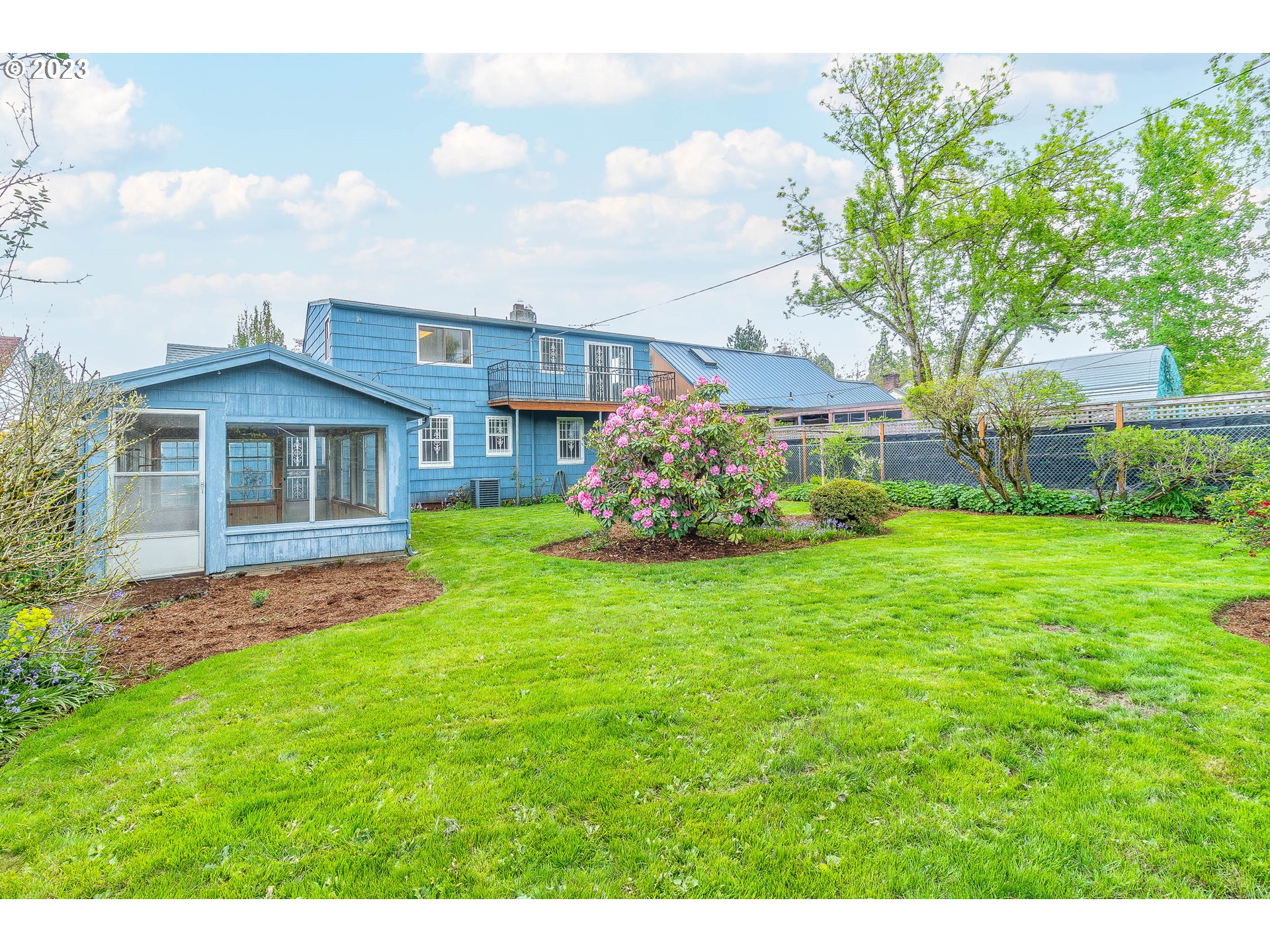 7343 North Foss Avenue Portland, OR 97203 - Photo 35 of 39 a view of a house with a yard
