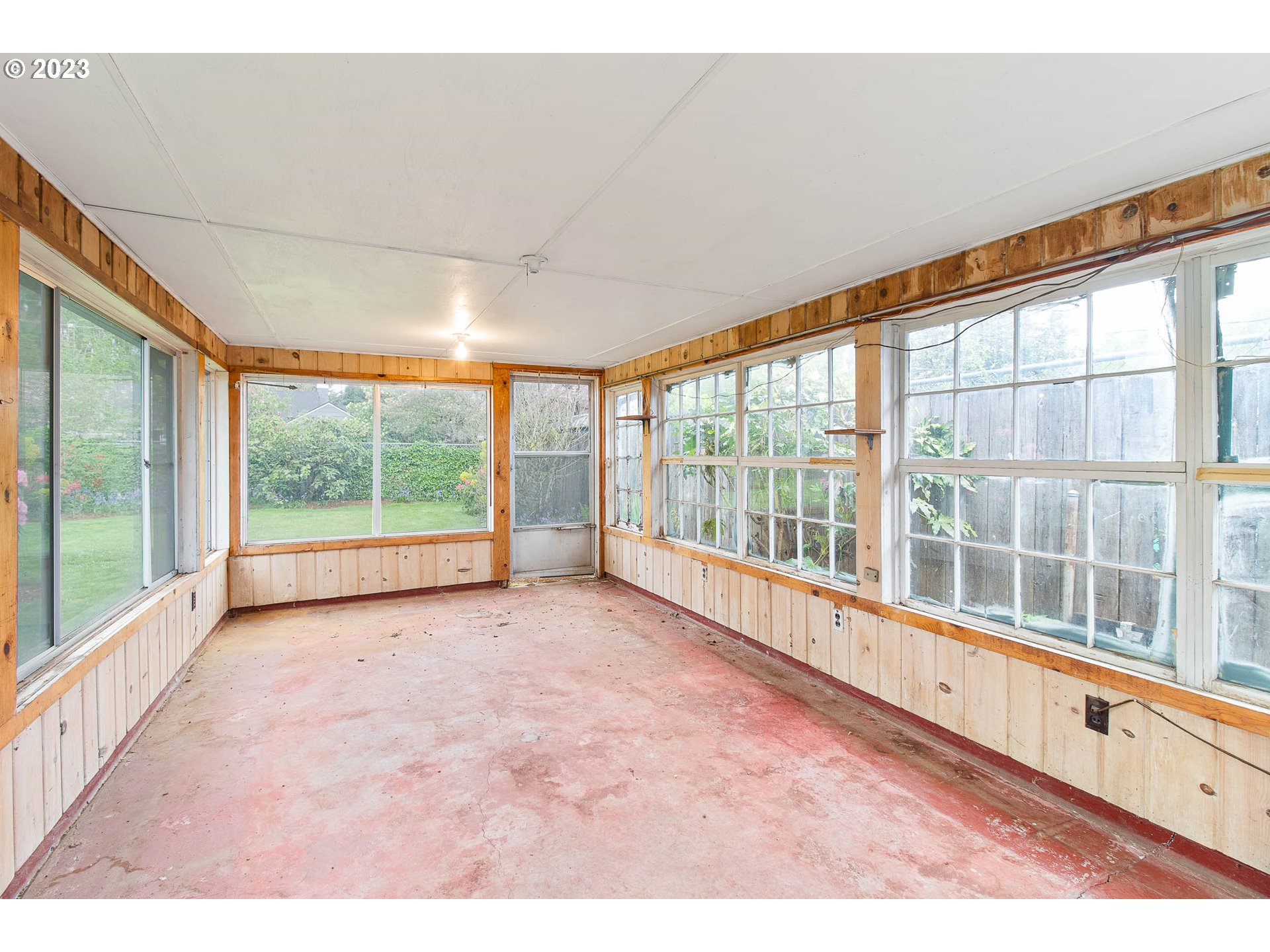 7343 North Foss Avenue Portland, OR 97203 - Photo 37 of 39 a view of an empty room with wooden floor and a large window