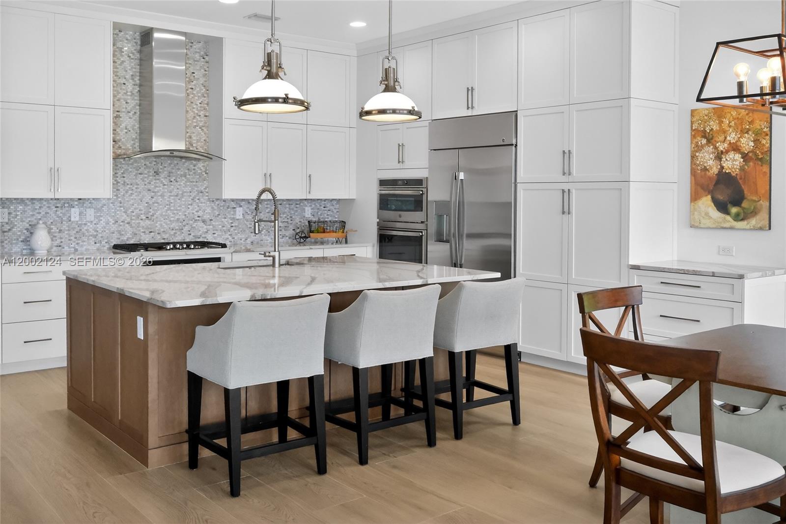 8871 New River Falls Road Boca Raton, FL 33496 - Photo 13 of 47 Kitchen and Dining area