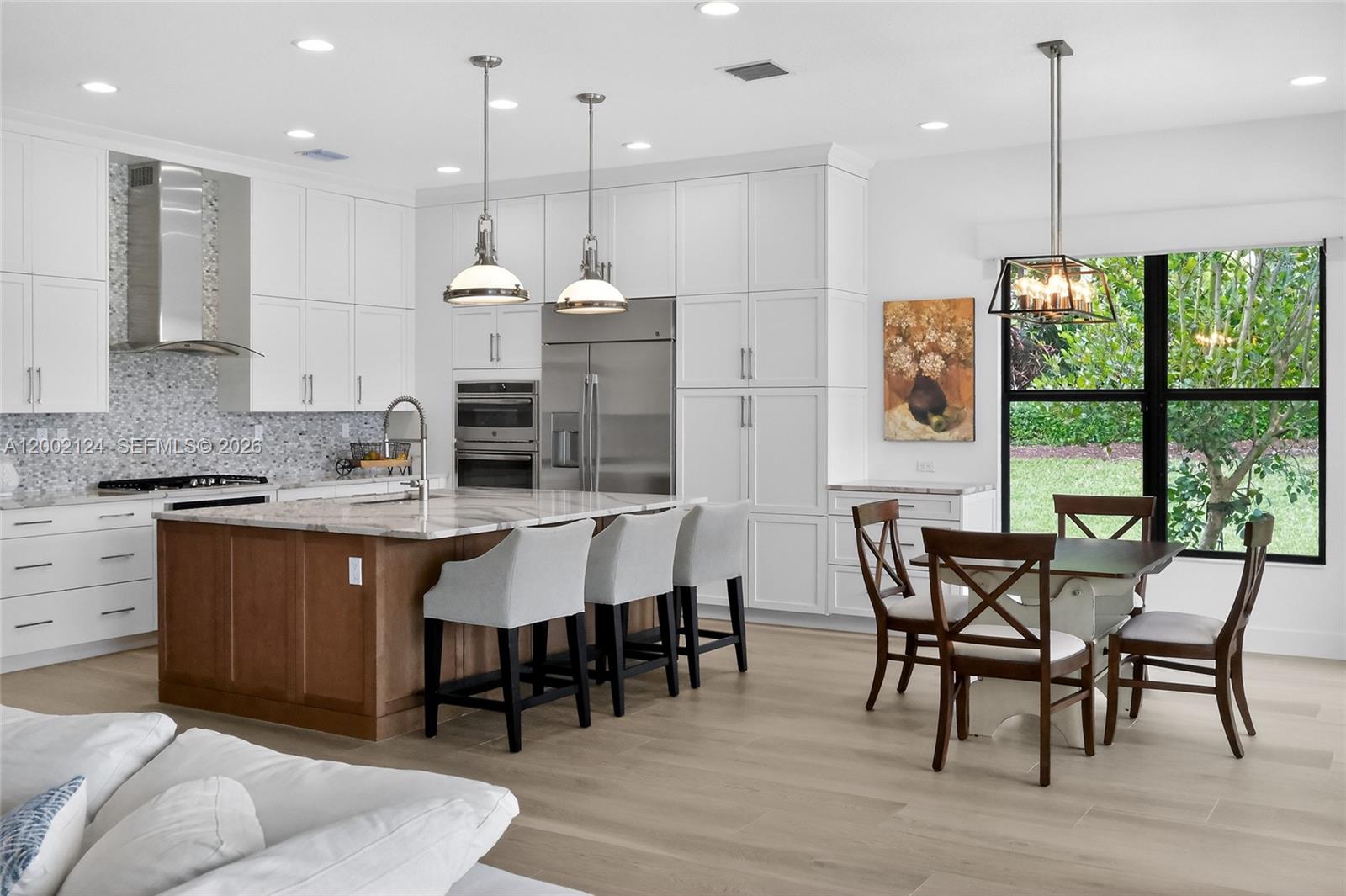 8871 New River Falls Road Boca Raton, FL 33496 - Photo 14 of 47 Kitchen and Dining area